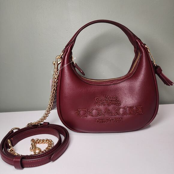 NWT Coach CCE60 Carmen Mini Crossbody Beaded Coach Graphic In DARK WINE Leather - Picture 1 of 7